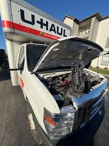 Jump-start for a box truck with its hood open